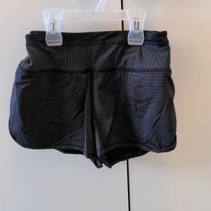 Lululemon shorts, size 8, black with copper stripes